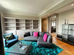 Appartement haut standing 125m2 / Parking privé plein centre-ville avec vue panoramique
